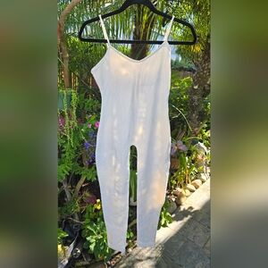 Vintage Jumping Joy | White Sleeveless Catsuit- Body Suit
